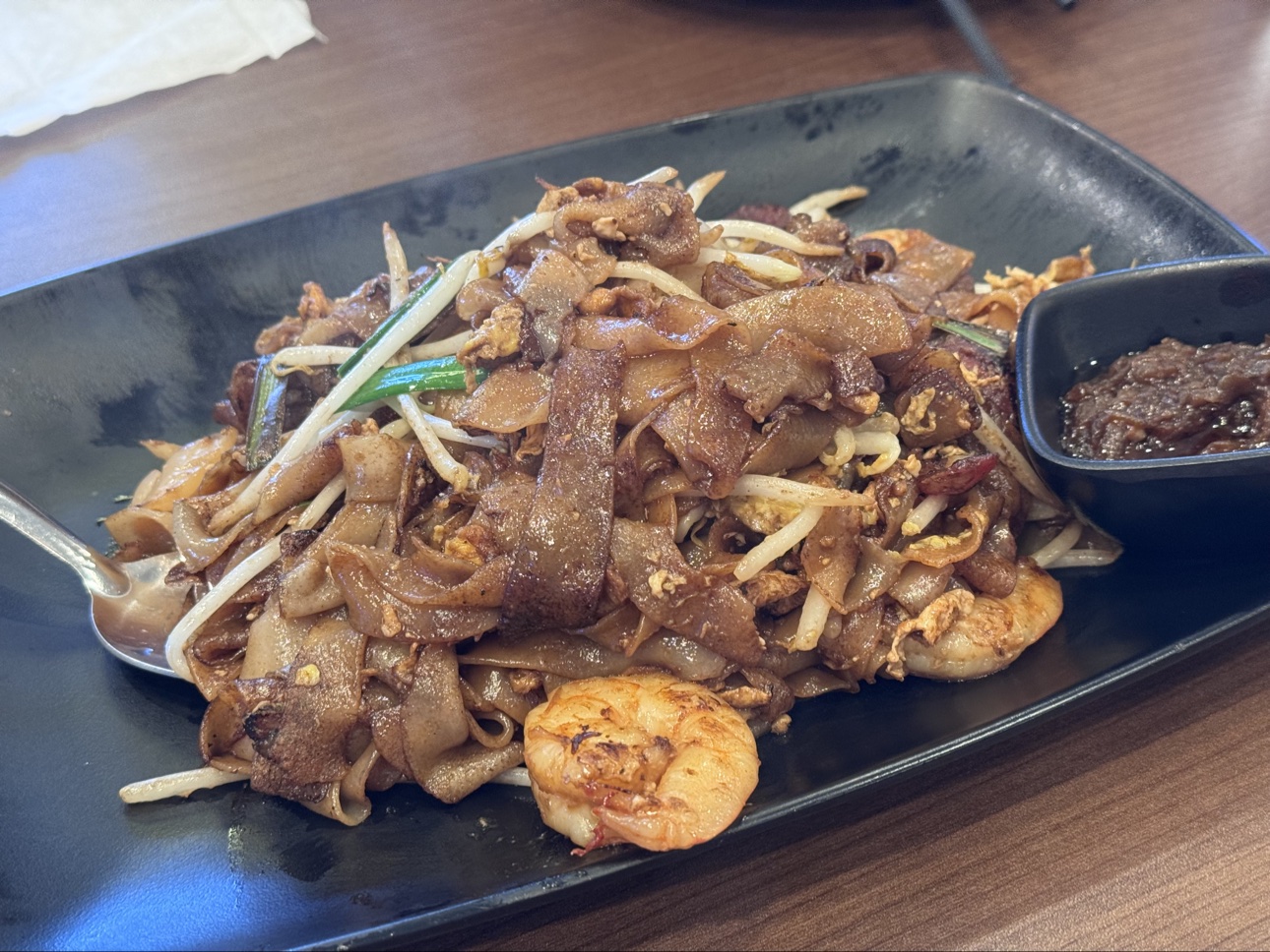 Char kway teow with shrimp and bean sprouts