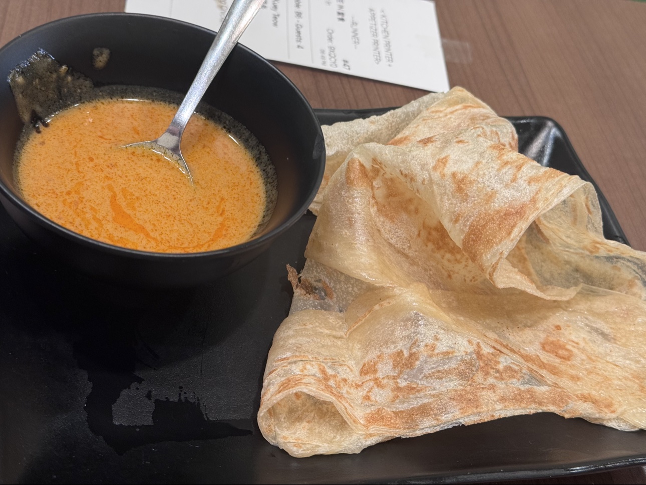 Roti canai with curry