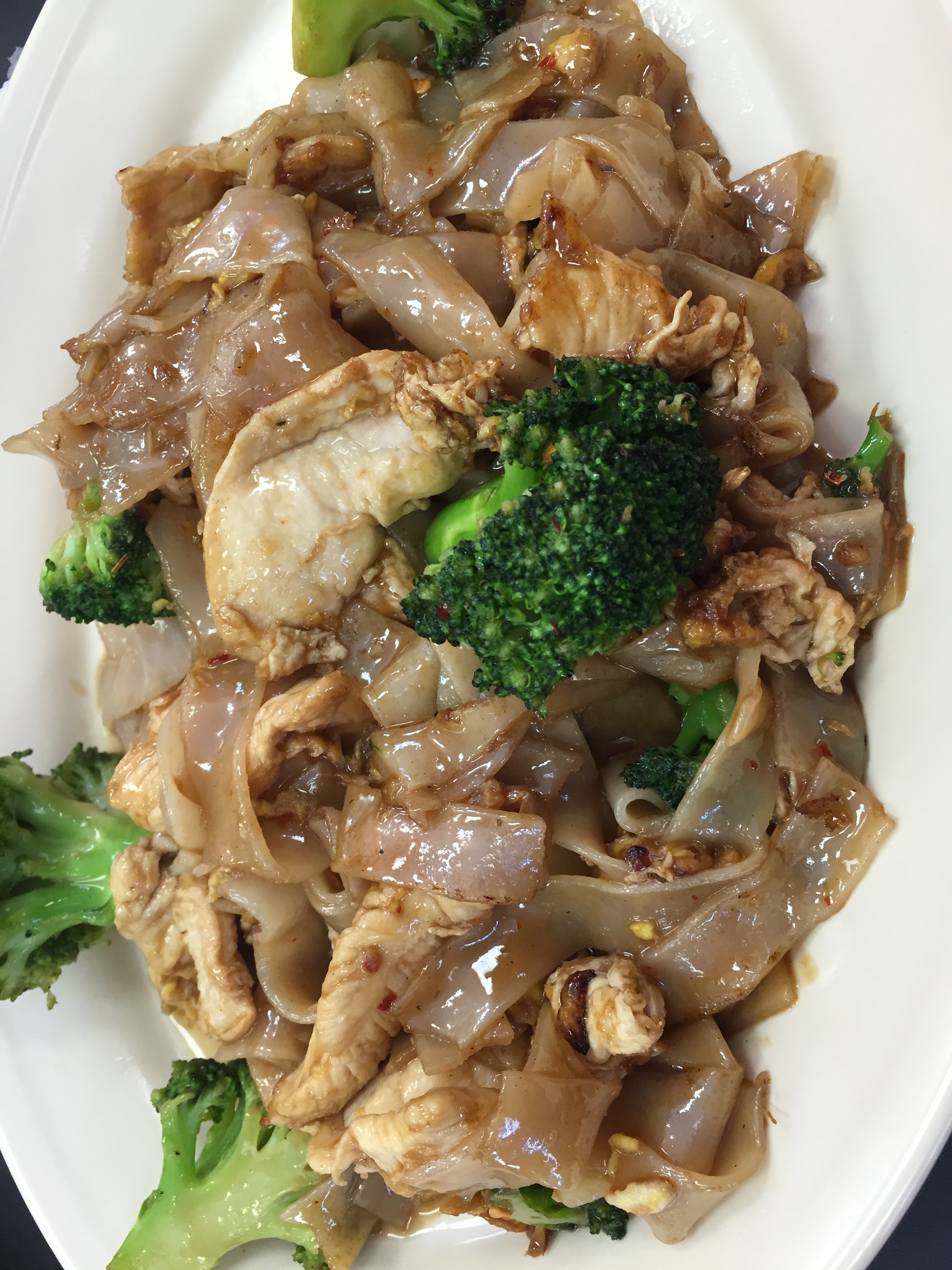 Pad See Ew at Nara Thai — wide flat rice noodles with chicken and broccoli in sweet soy sauce