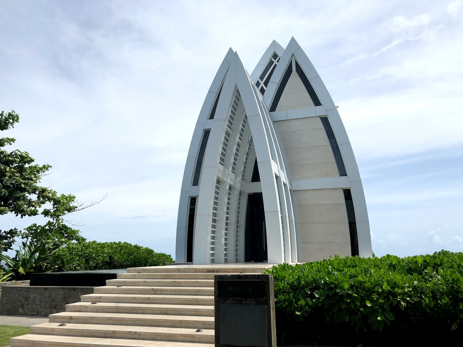 The Ritz-Carlton Bali wedding chapel — twin white spires against the sky