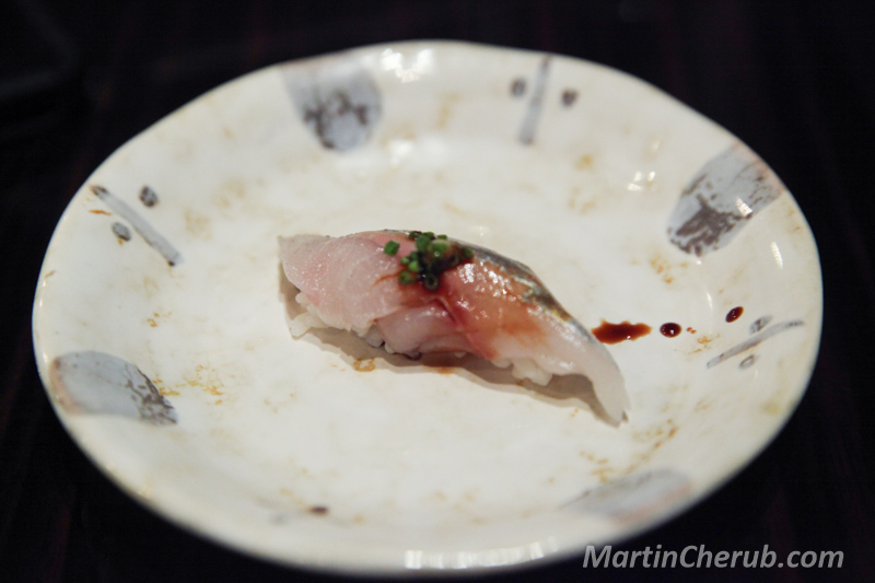 Aji nigiri with scallion and soy